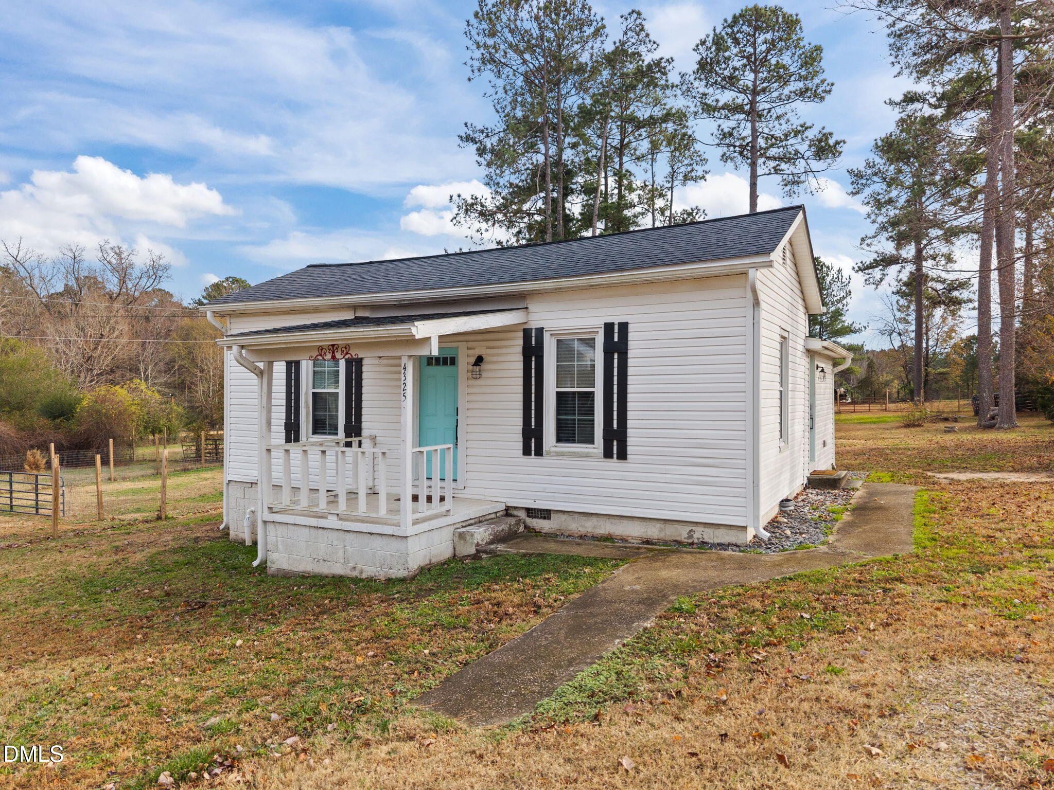 4325 Auburn Knightdale Road Raleigh, NC 27610 - Photo 2 of 34 a view of a house with a yard