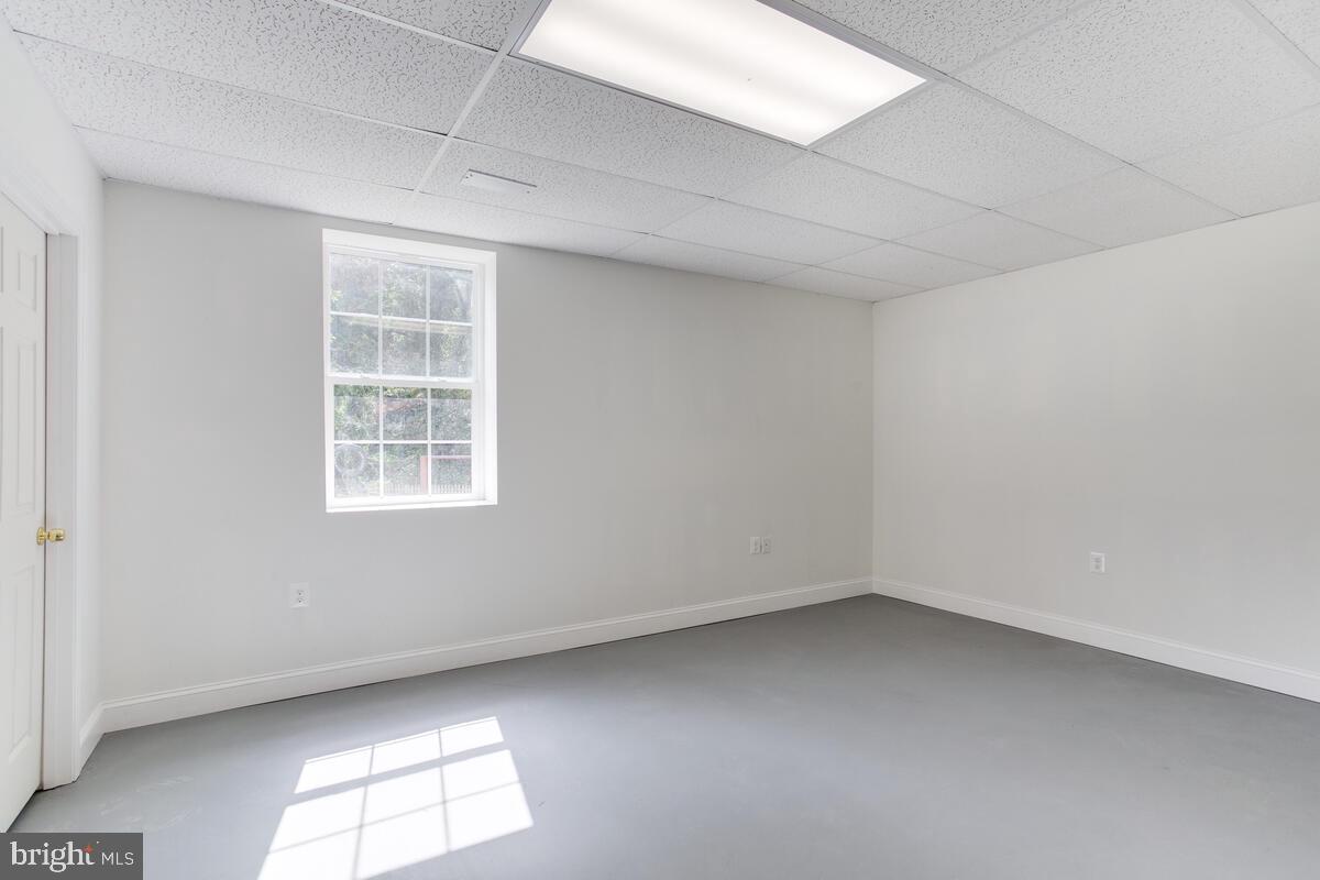 4425 Solomons Island Road Huntingtown, MD 20639 - Photo 53 of 65 an empty room with a window