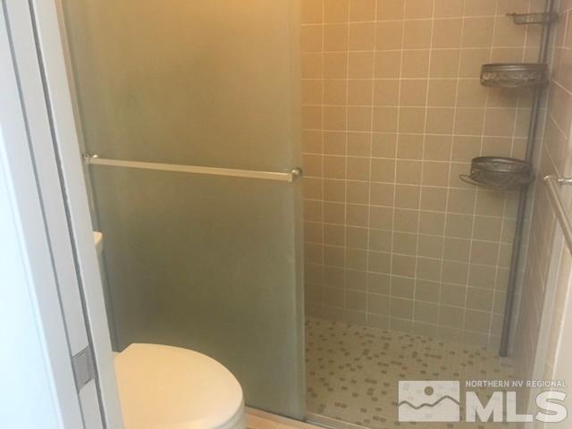1937 South Villa Way Reno, NV 89509 - Photo 15 of 21 a bathroom with a toilet and a shower