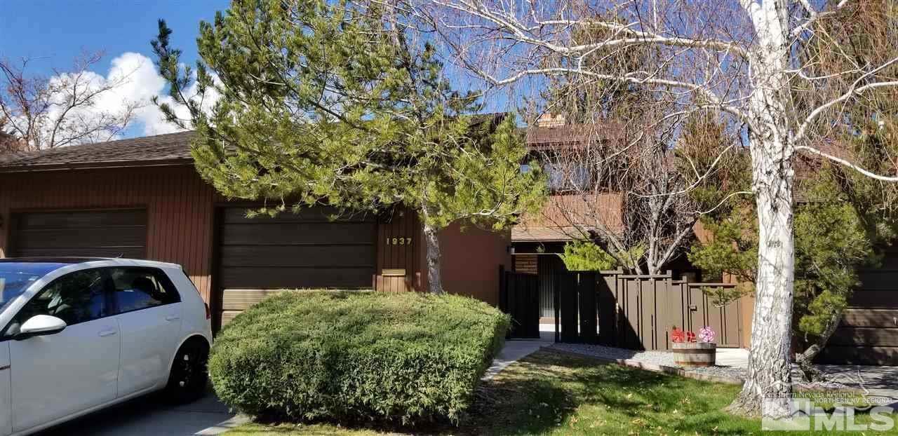 1937 South Villa Way Reno, NV 89509 - Photo 2 of 21 a view of a backyard with potted plants and large tree