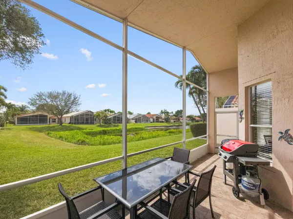 a large room with lots of furniture and a flat screen tv