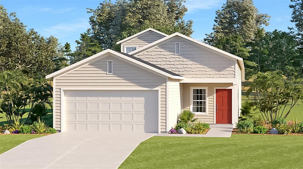 8890 Southwest 68th Ter Road Ocala, FL 34476 - Photo 1 of 1 a front view of a house with a yard