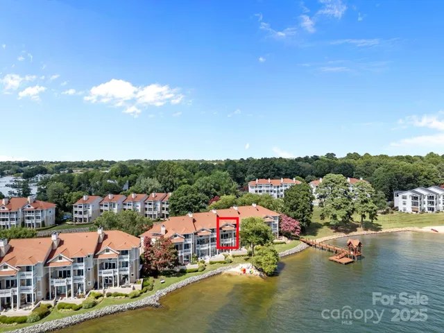 a view of a lake with a city