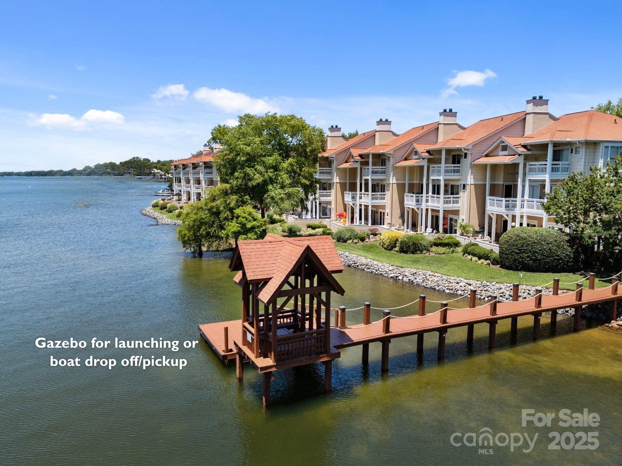 17925 Kings Point Drive, Unit F Cornelius, NC 28031 - Photo 33 of 35 a view of swimming pool with outdoor seating