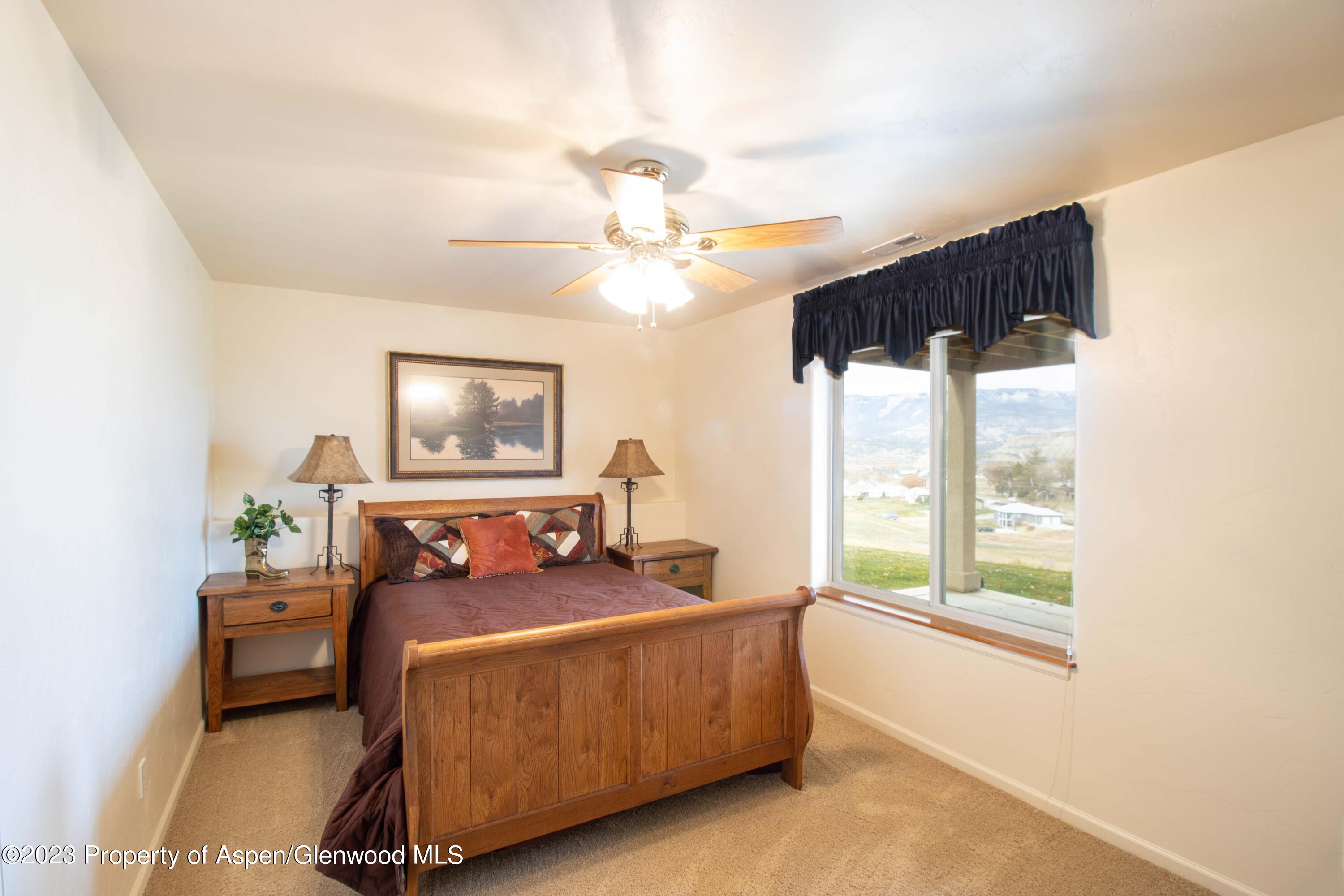 1413 Fir Court Rifle, CO 81650 - Photo 11 of 23 a living room with furniture and a window