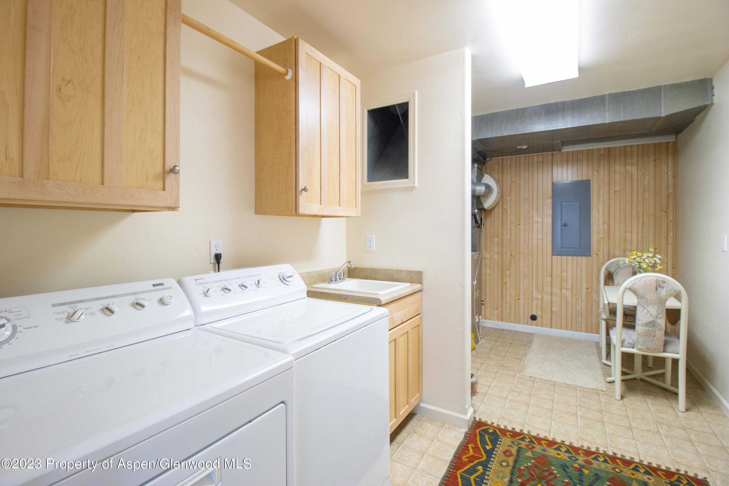 1413 Fir Court Rifle, CO 81650 - Photo 15 of 23 a utility room with dryer and washer