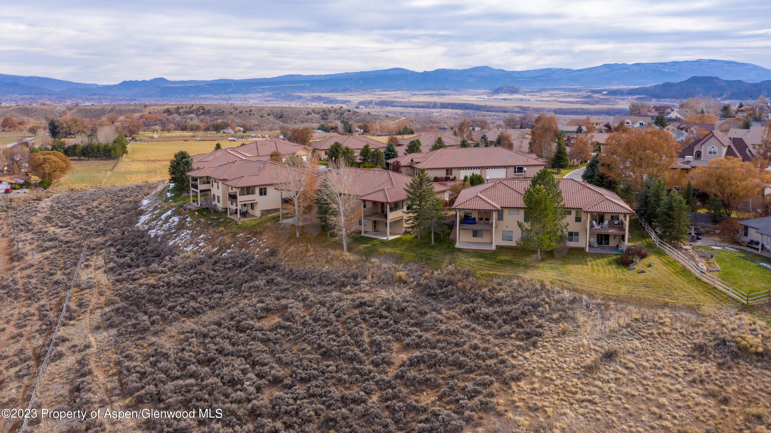 1413 Fir Court Rifle, CO 81650 - Photo 22 of 23 a view of a town with mountains in the background
