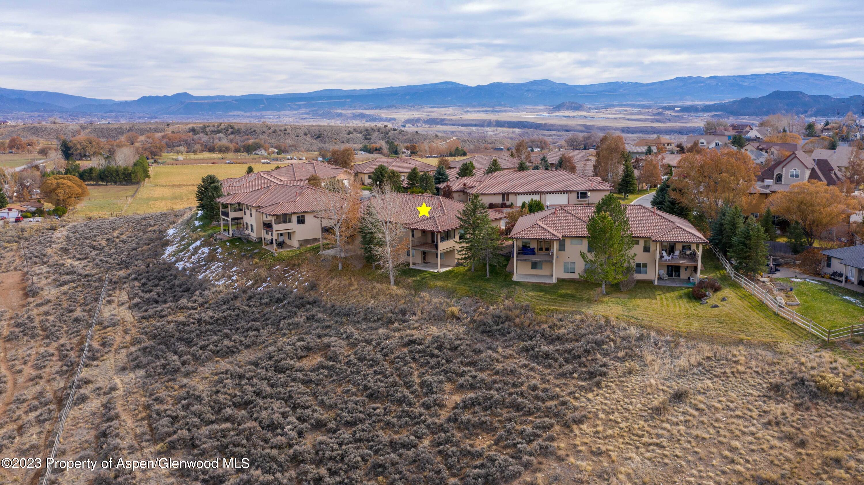 1413 Fir Court Rifle, CO 81650 - Photo 23 of 23 a view of a town with mountains in the background