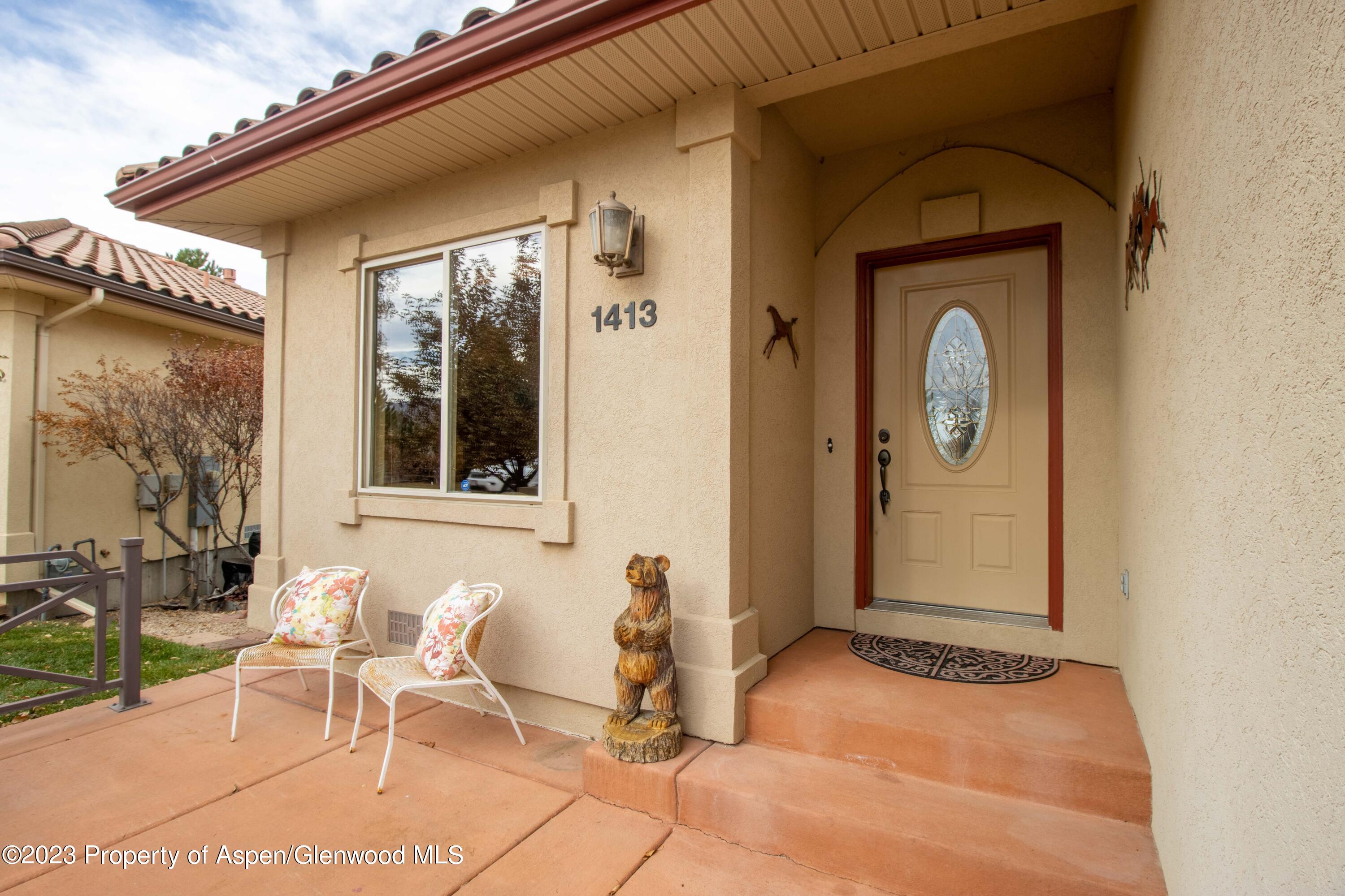 1413 Fir Court Rifle, CO 81650 - Photo 3 of 23 a view of a entryway door of the house
