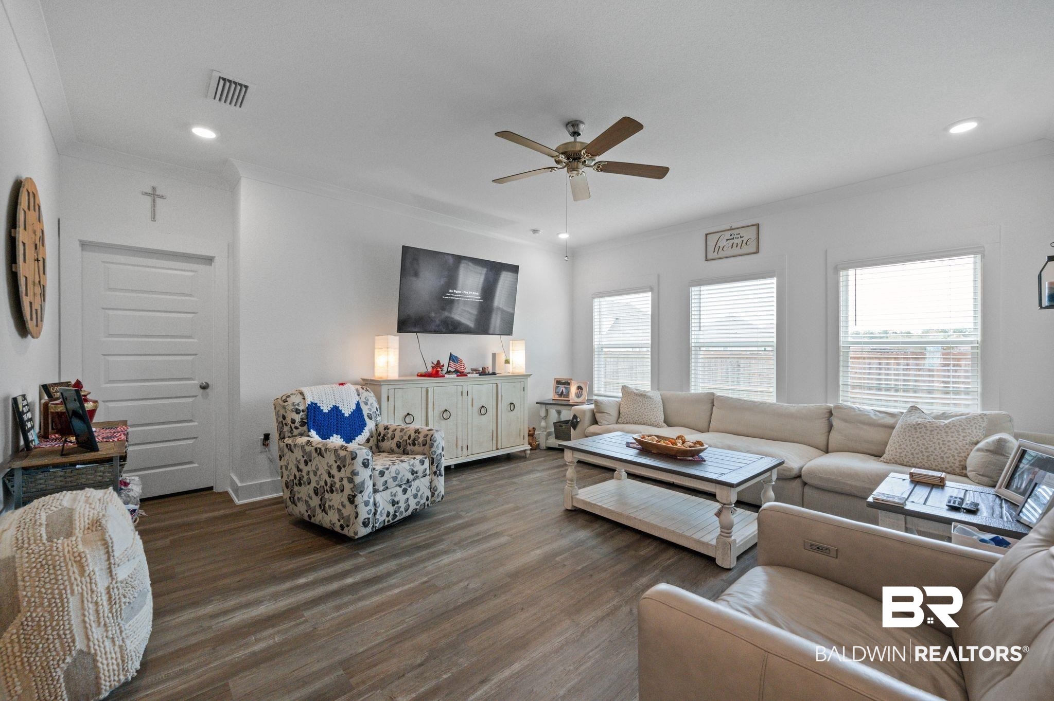8508 Rosedown Lane Daphne, AL 36526 - Photo 16 of 29 Living room with dark wood-type flooring, crown molding, a ceiling fan, and recessed lighting