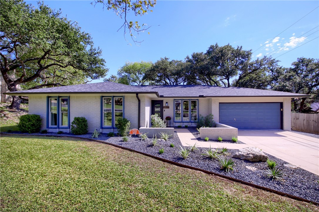 8802 Silverarrow Circle Austin, TX 78759 - Photo 1 of 1 front view of a house with a patio