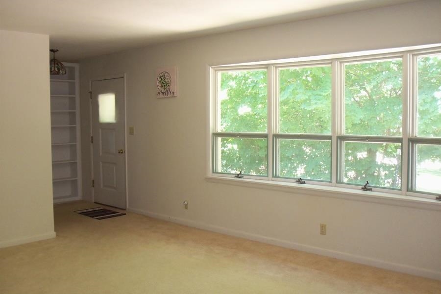 1210 South Prairie Avenue Freeport, IL 61032 - Photo 2 of 22 an empty room with a window