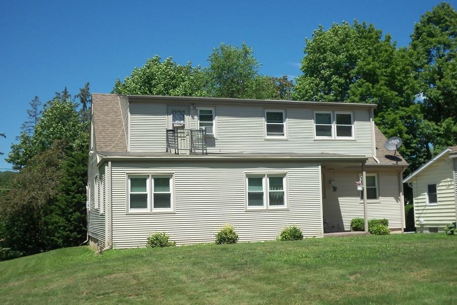 1210 South Prairie Avenue Freeport, IL 61032 - Photo 21 of 22 a view of a house with a yard
