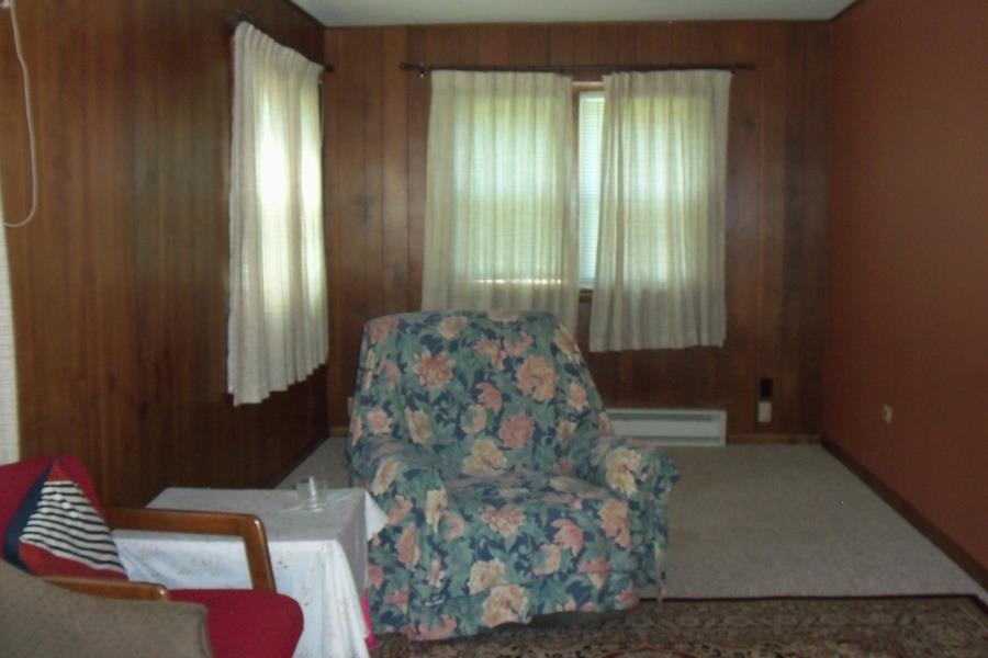 1210 South Prairie Avenue Freeport, IL 61032 - Photo 6 of 22 a living room with furniture and a large window