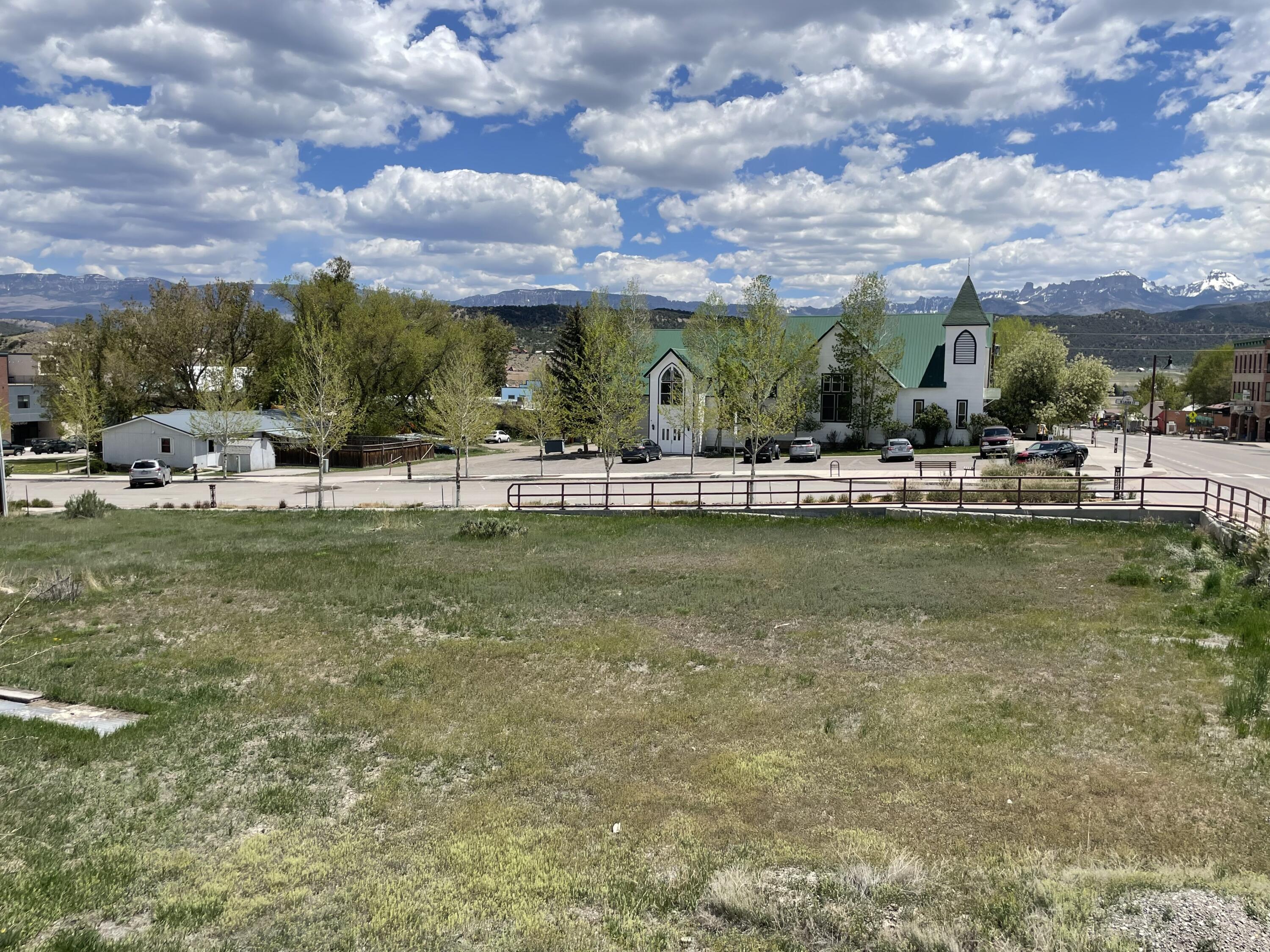 Tbd Sherman Street Ridgway, CO 81432 - Photo 3 of 3 a view of houses with outdoor space and lakeside