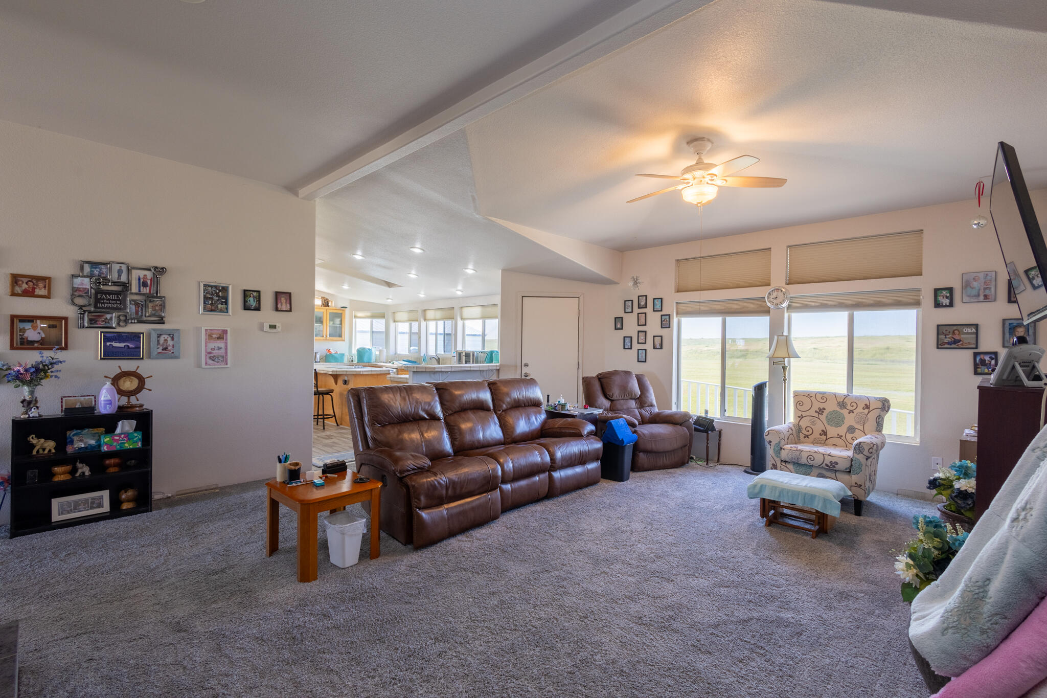 20735 Gyle Road Corning, CA 96021 - Photo 12 of 39 a living room with furniture and a chandelier