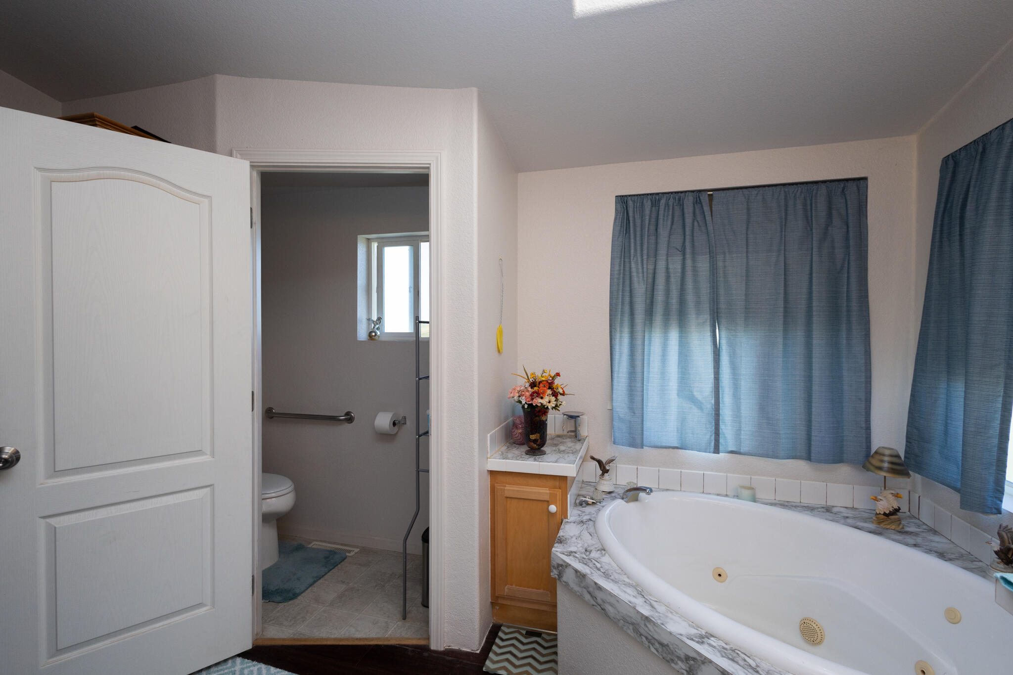 20735 Gyle Road Corning, CA 96021 - Photo 17 of 39 a bathroom with a tub and sink