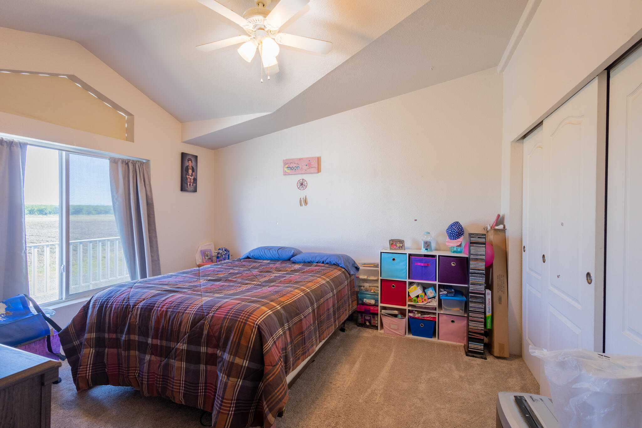 20735 Gyle Road Corning, CA 96021 - Photo 21 of 39 a bed sitting in a bedroom next to a window