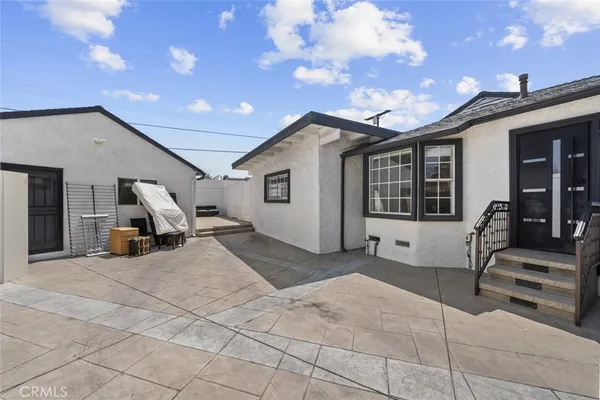 a view of a house with a patio
