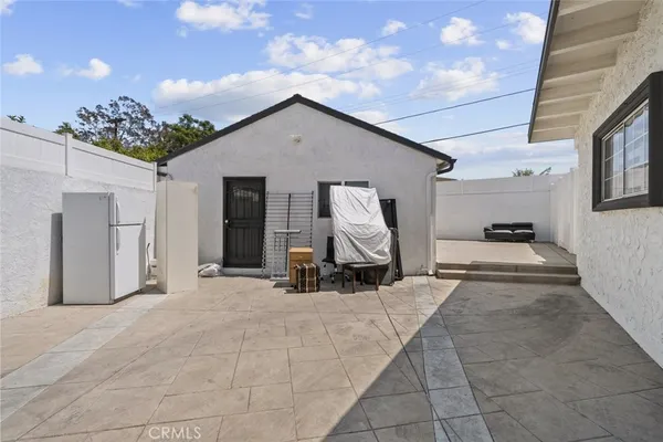 a front view of a house with yard