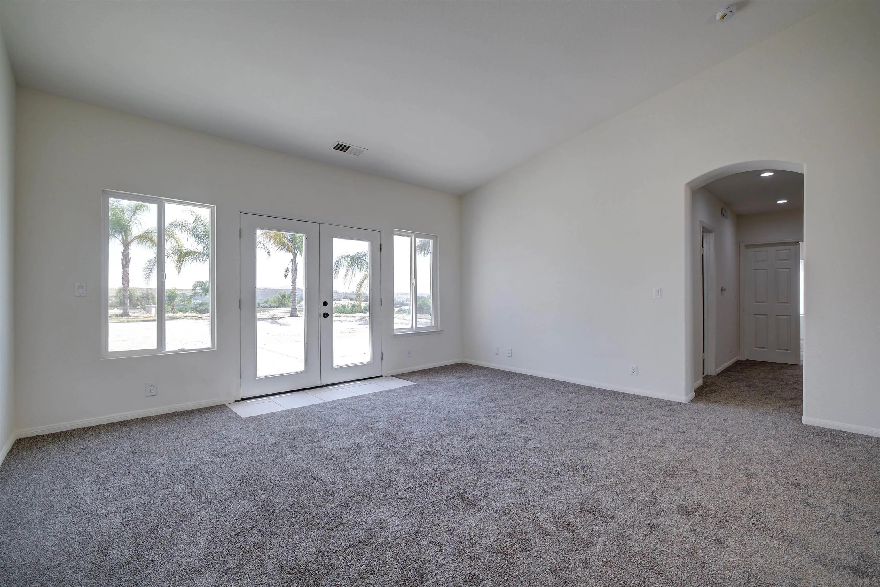 31250 Rivoli Road Valley Center, CA 92082 - Photo 13 of 57 an empty room with windows