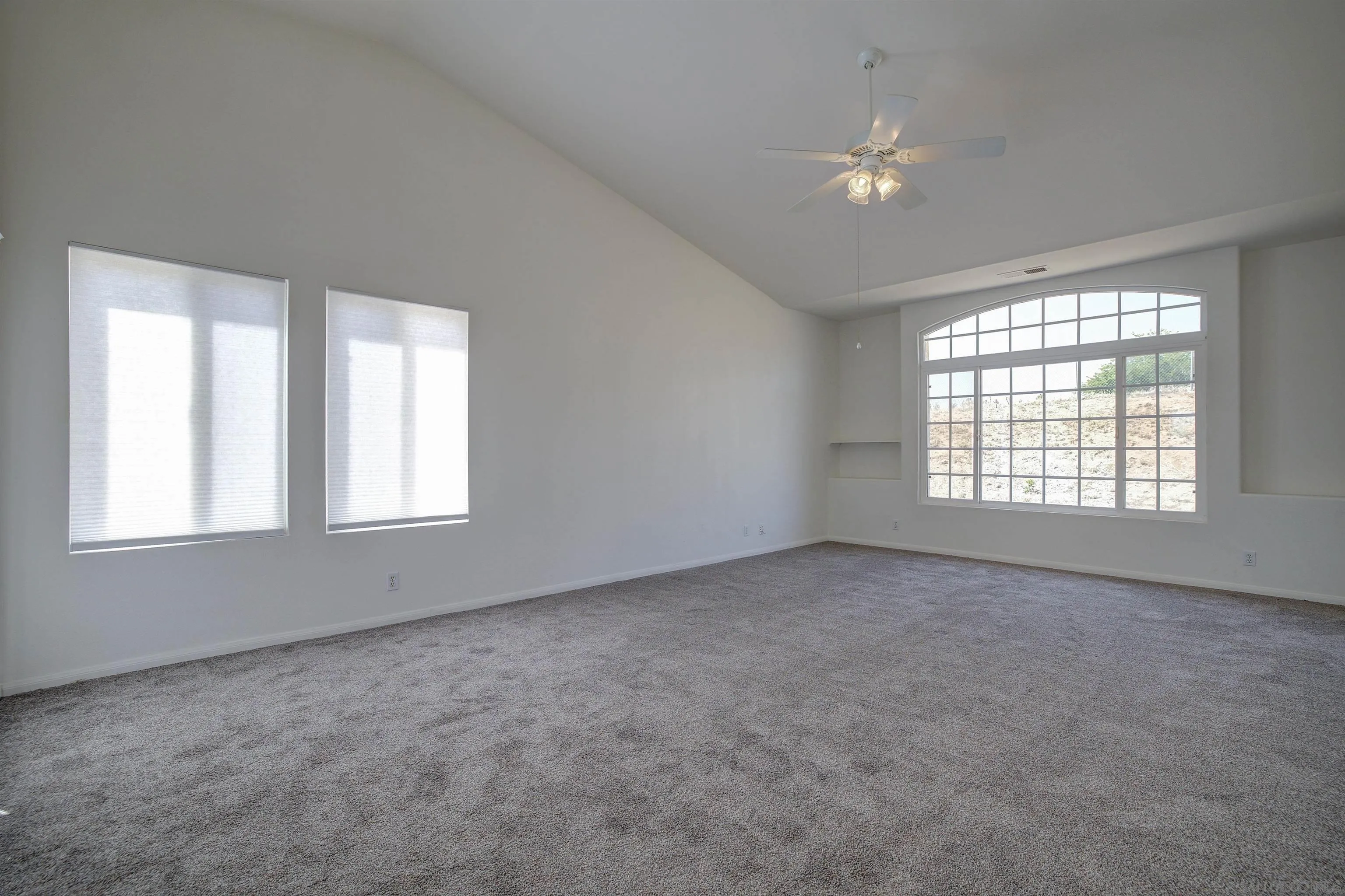 31250 Rivoli Road Valley Center, CA 92082 - Photo 28 of 57 an empty room with a empty space and windows