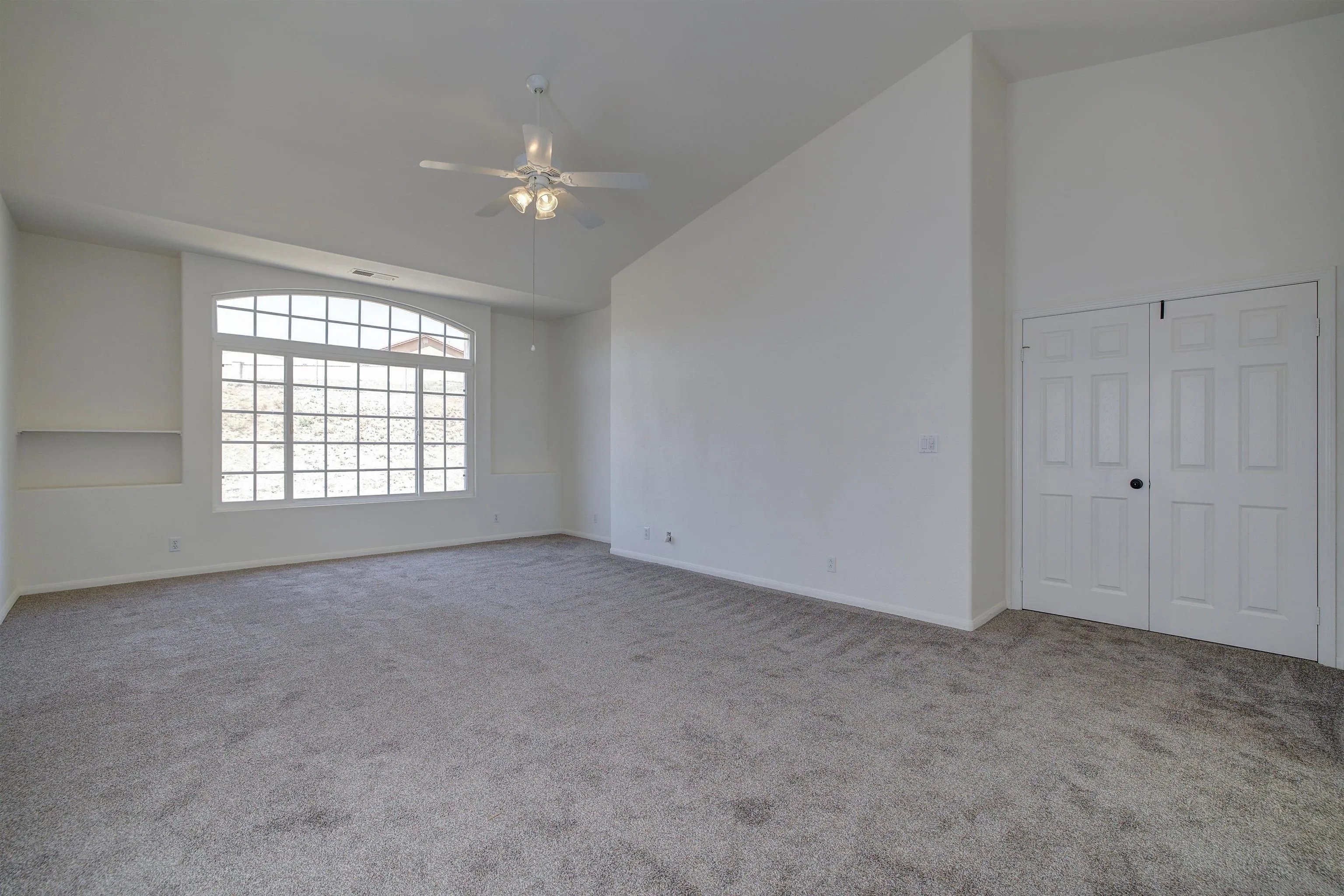 31250 Rivoli Road Valley Center, CA 92082 - Photo 31 of 57 an empty room with windows and closet