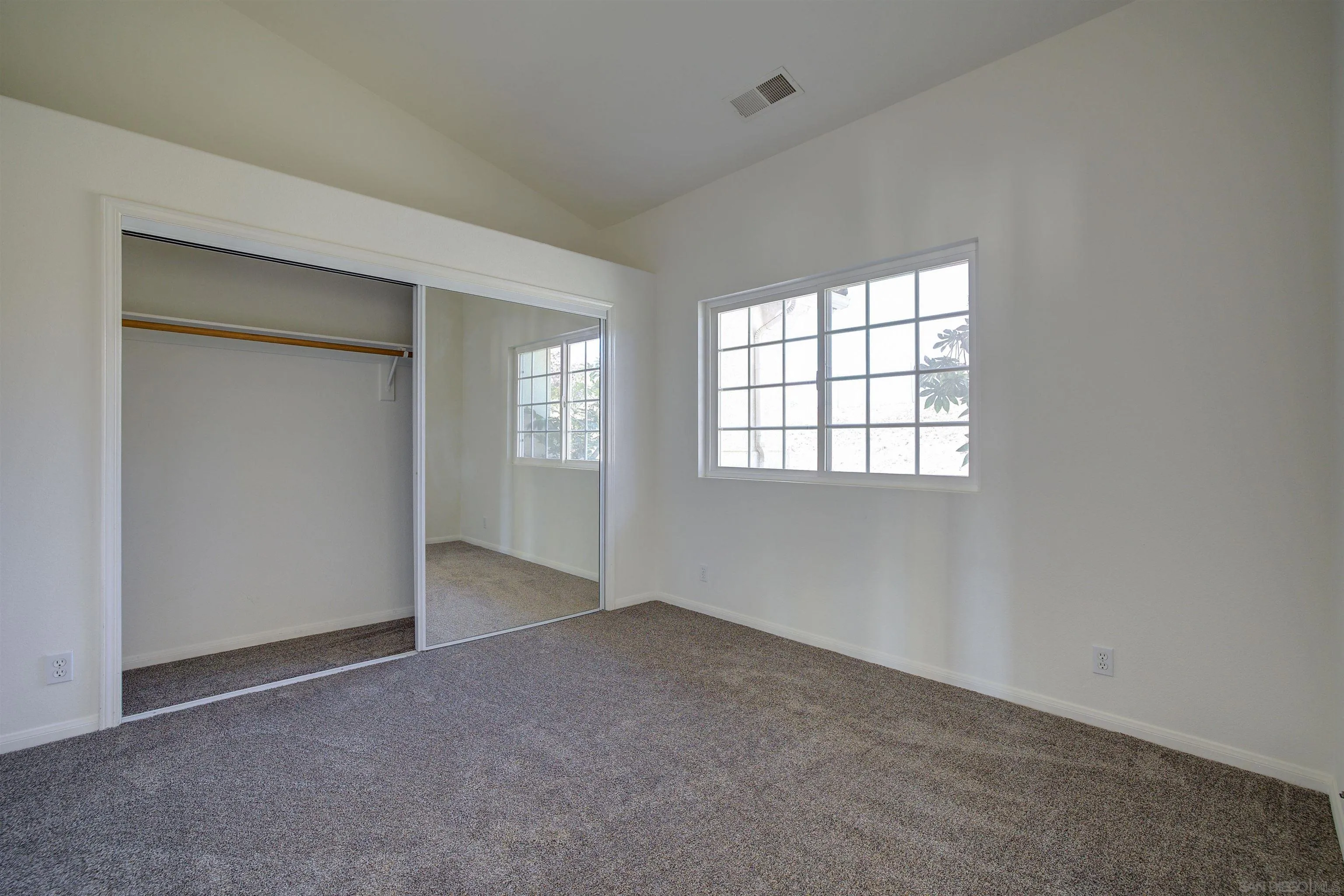 31250 Rivoli Road Valley Center, CA 92082 - Photo 37 of 57 an empty room with windows
