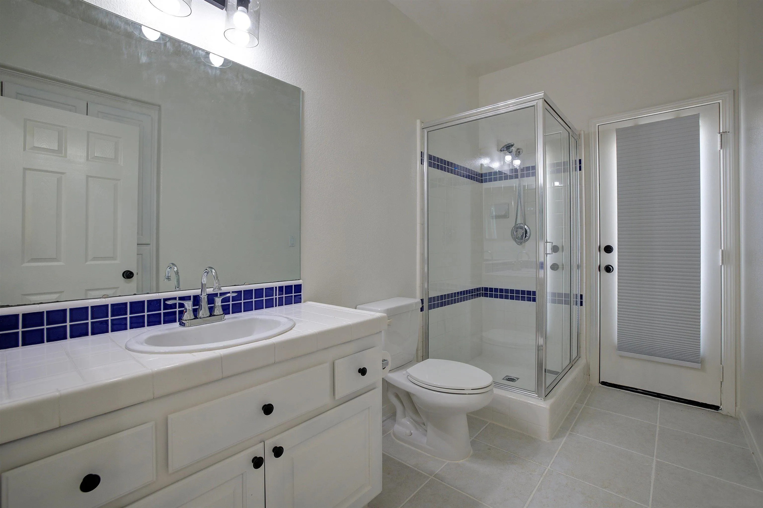 31250 Rivoli Road Valley Center, CA 92082 - Photo 38 of 57 a bathroom with a sink a toilet and shower