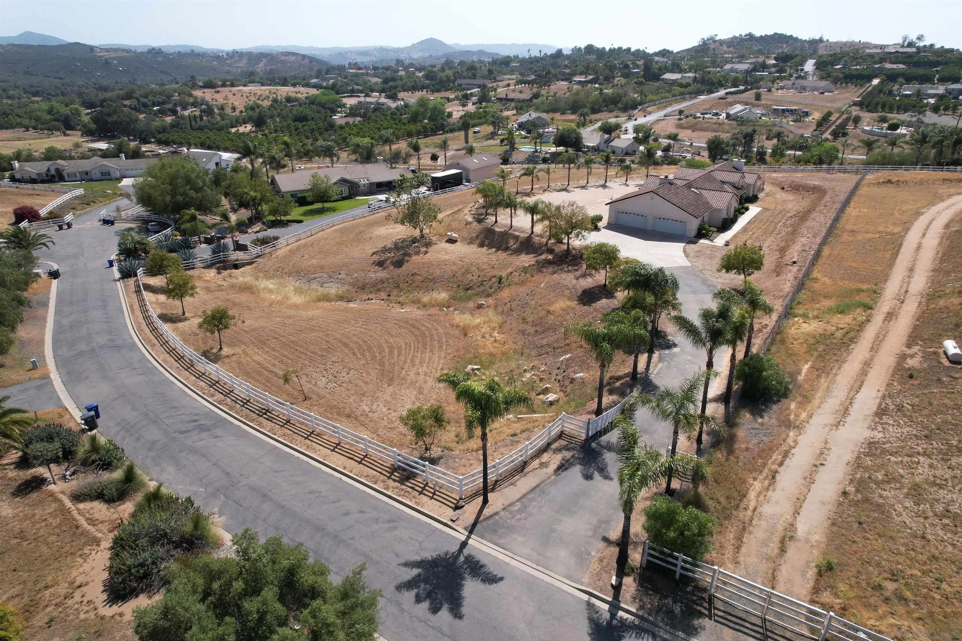 31250 Rivoli Road Valley Center, CA 92082 - Photo 50 of 57 an aerial view of a house with a mountain