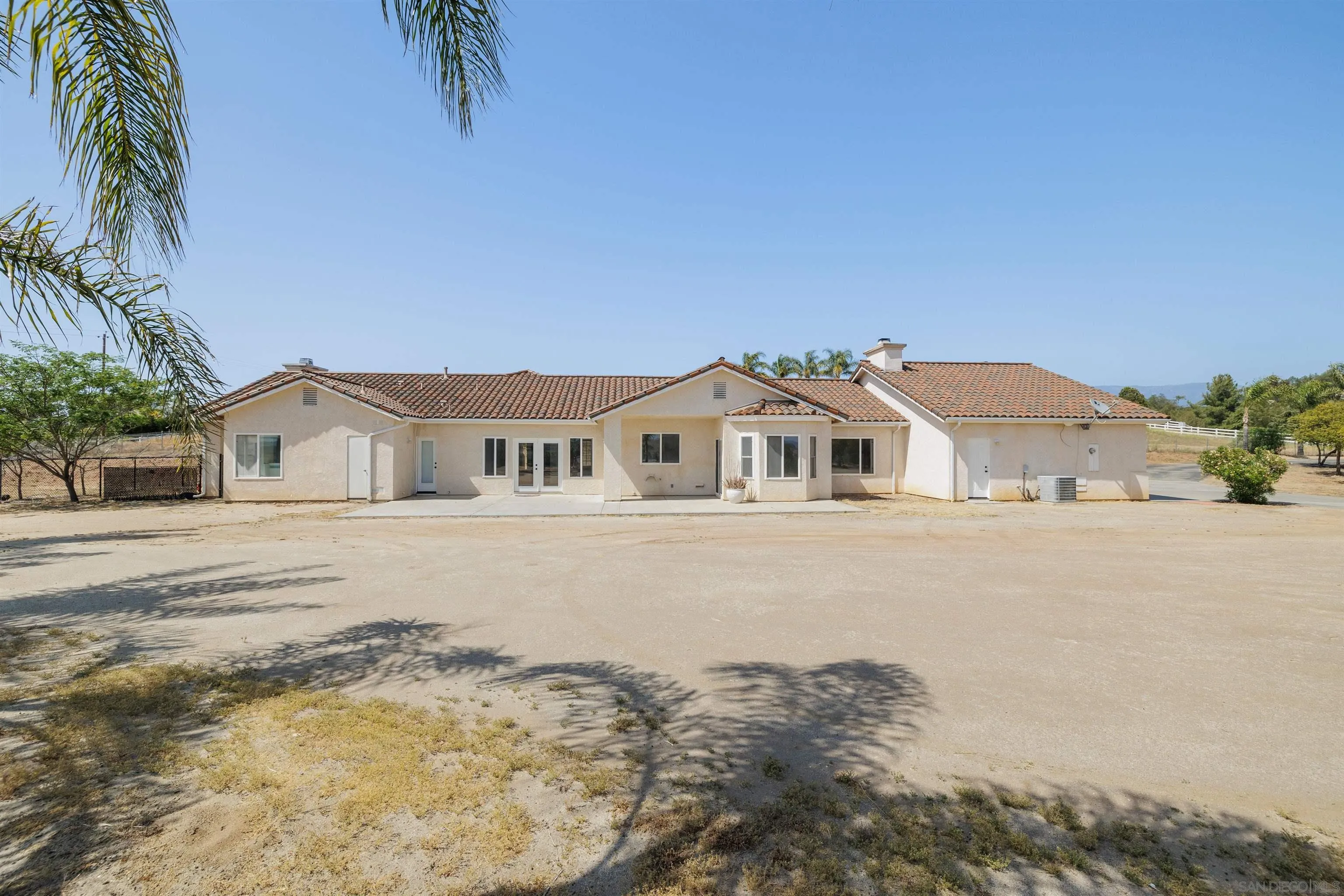 31250 Rivoli Road Valley Center, CA 92082 - Photo 5 of 57 a front view of a house with a yard