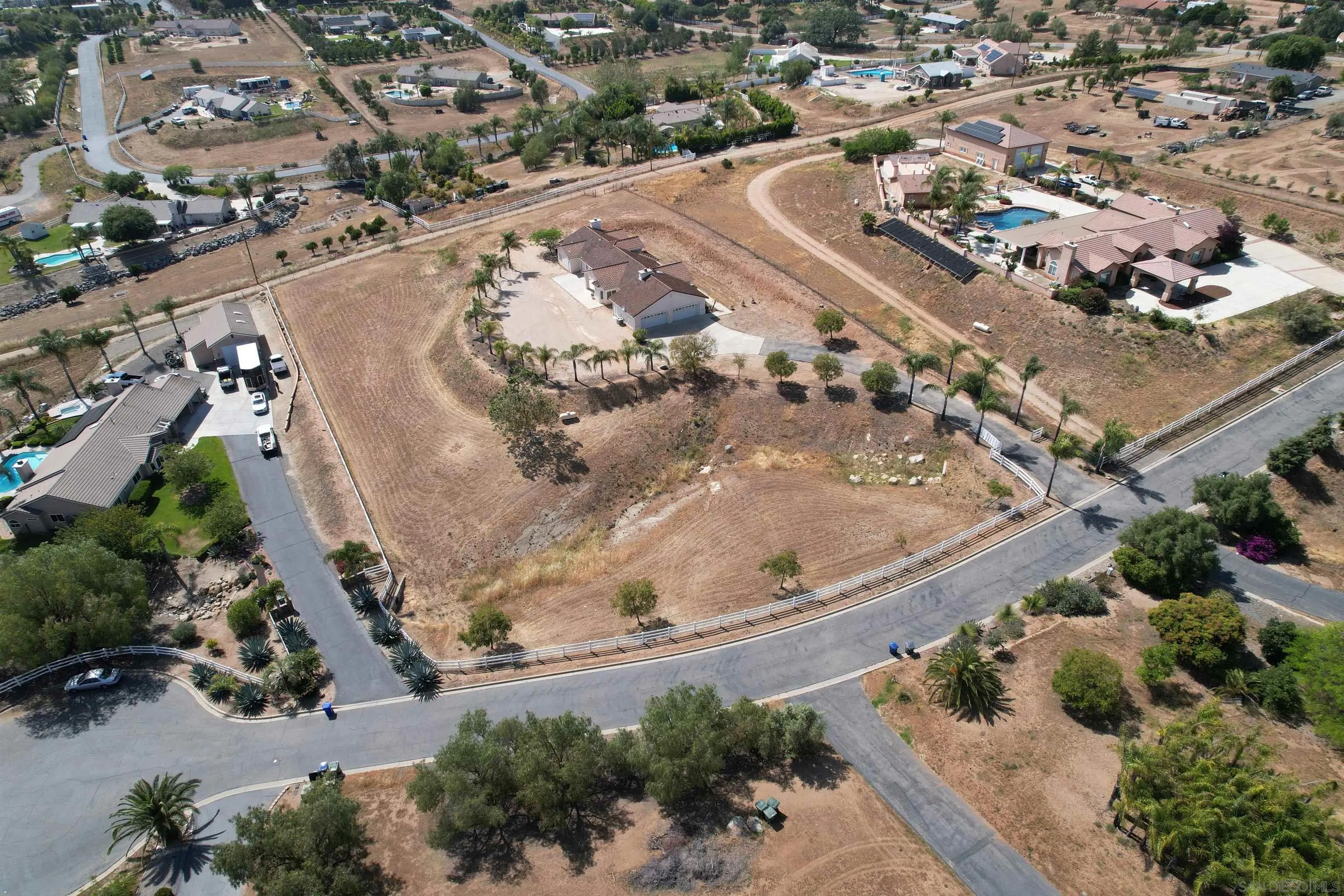 31250 Rivoli Road Valley Center, CA 92082 - Photo 51 of 57 an aerial view of a house with a yard
