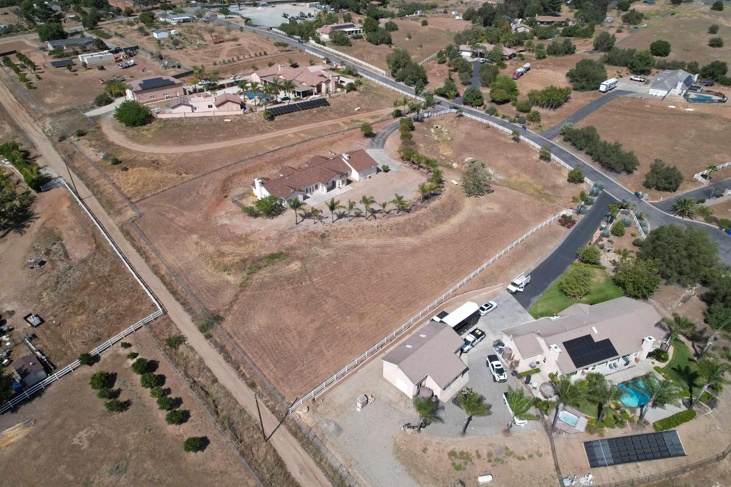 31250 Rivoli Road Valley Center, CA 92082 - Photo 52 of 57 an aerial view of a house with a yard