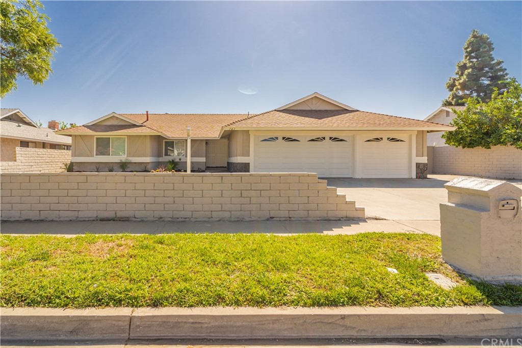 161 East Arbeth Street Rialto, CA 92377 - Photo 1 of 1 a view of a house with a swimming pool