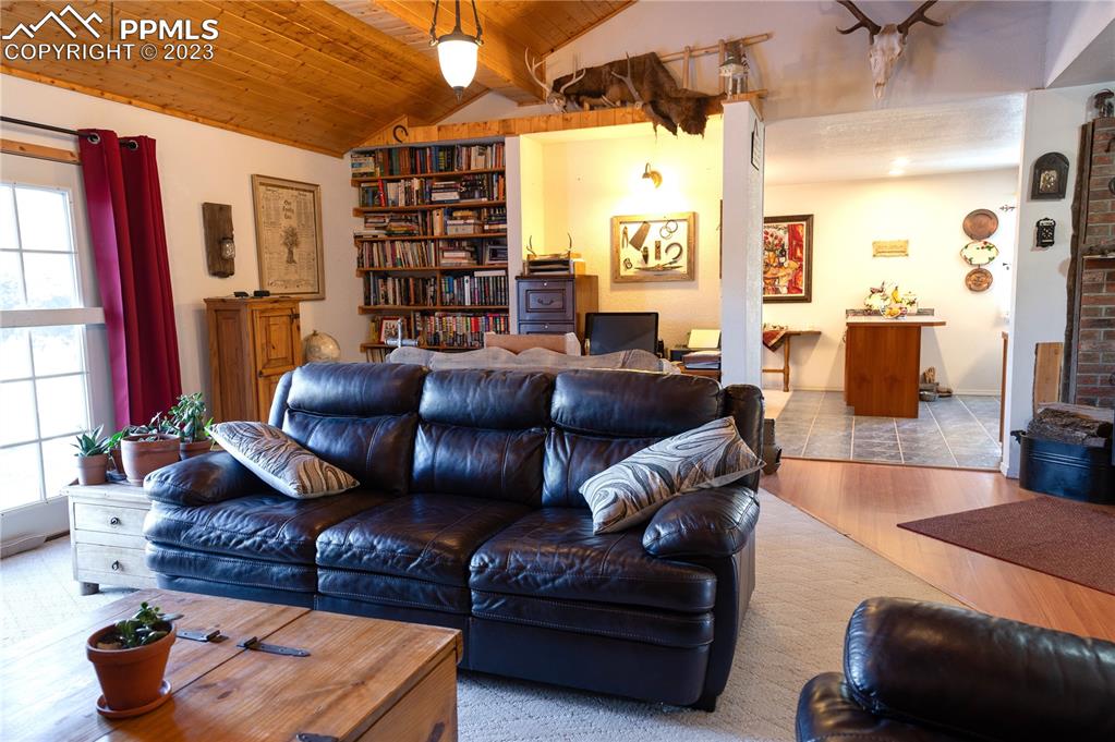 3370 Schieffelin Road Fort Garland, CO 81133 - Photo 14 of 46 a living room with furniture and a window