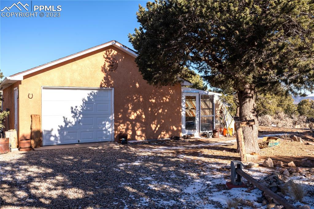 3370 Schieffelin Road Fort Garland, CO 81133 - Photo 35 of 46 a view of a house with a yard