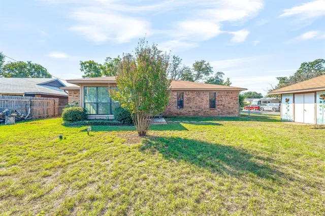a view of a house with a swimming pool