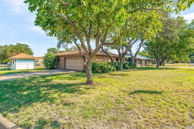 a house view with a outdoor space