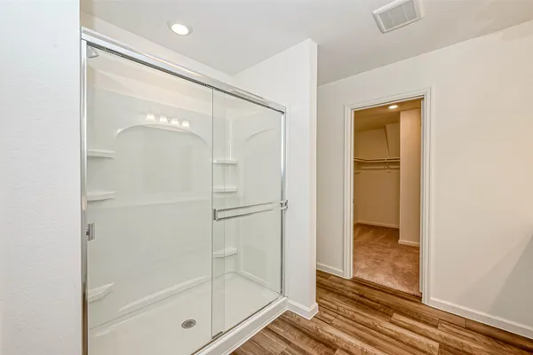 a bathroom with a sink vanity and a mirror