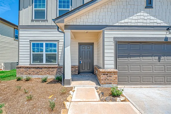 a front view of a house with entryway