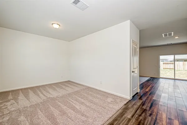 a view of an empty room and window