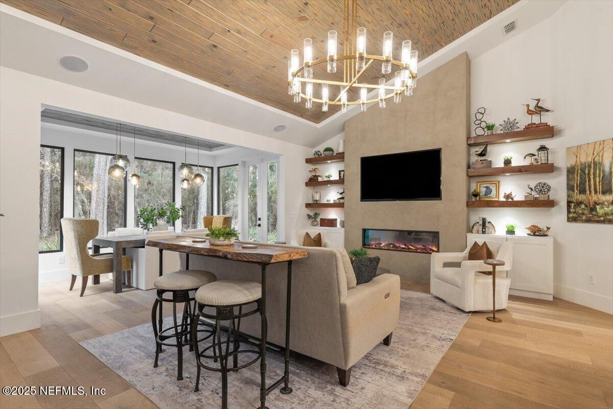 4009 Sioux Circle St. Johns, FL 32259 - Photo 11 of 49 a living room with fireplace furniture and a flat screen tv