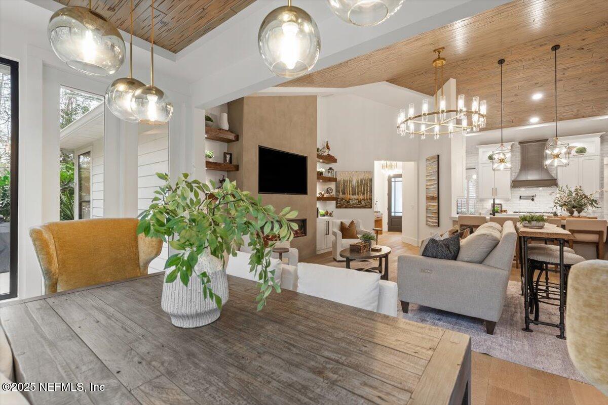 4009 Sioux Circle St. Johns, FL 32259 - Photo 15 of 49 a living room with furniture chandelier and a flat screen tv