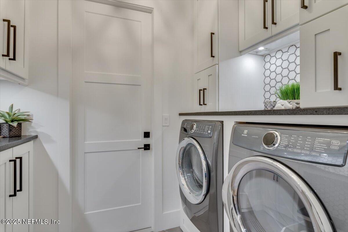 4009 Sioux Circle St. Johns, FL 32259 - Photo 24 of 49 a utility room with dryer and washer