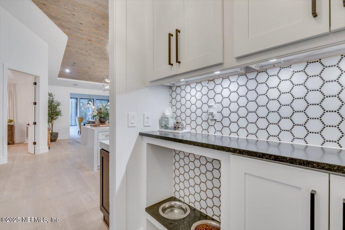 4009 Sioux Circle St. Johns, FL 32259 - Photo 25 of 49 a view of wooden cabinets and chair