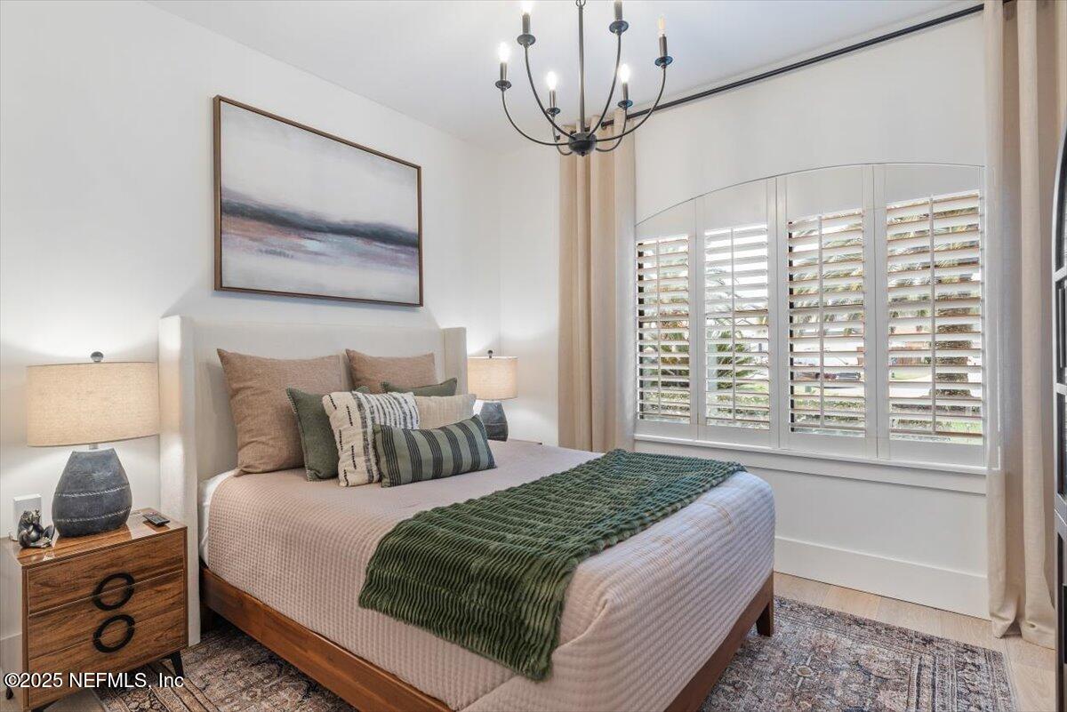 4009 Sioux Circle St. Johns, FL 32259 - Photo 34 of 49 a bedroom with bed and a window