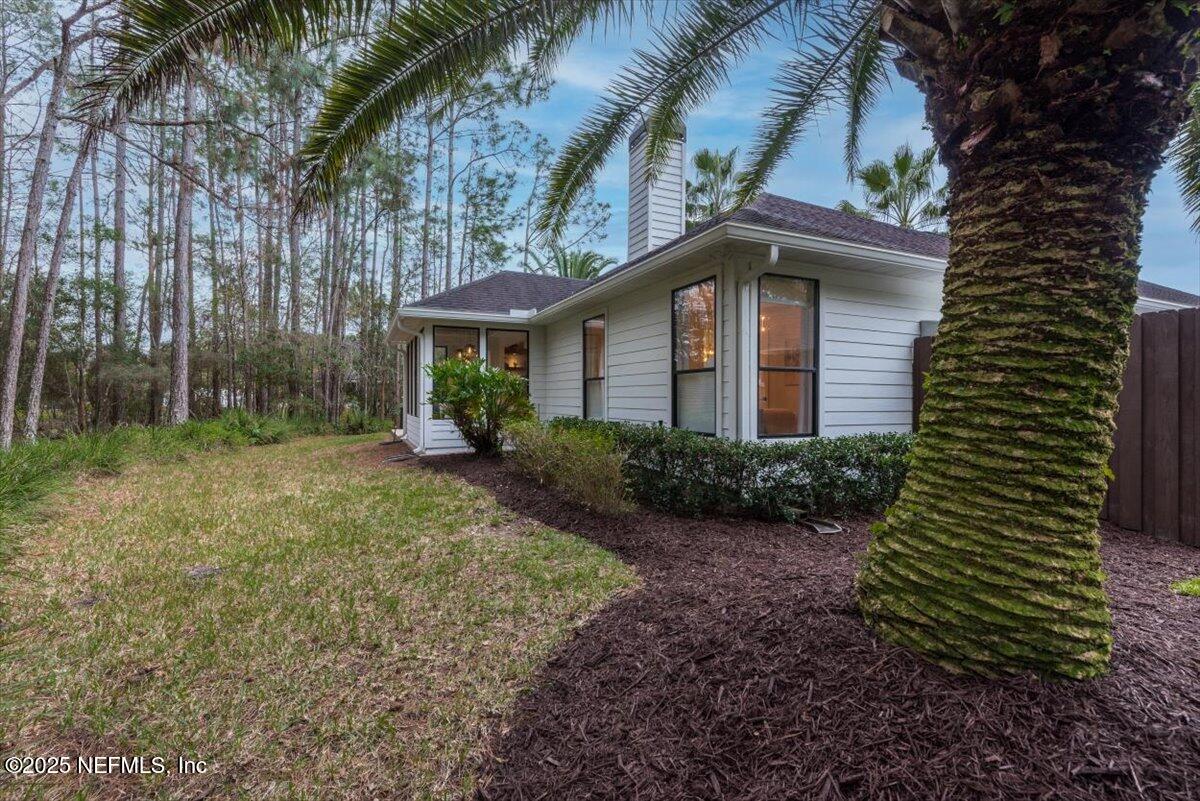 4009 Sioux Circle St. Johns, FL 32259 - Photo 45 of 49 a front view of a house with garden