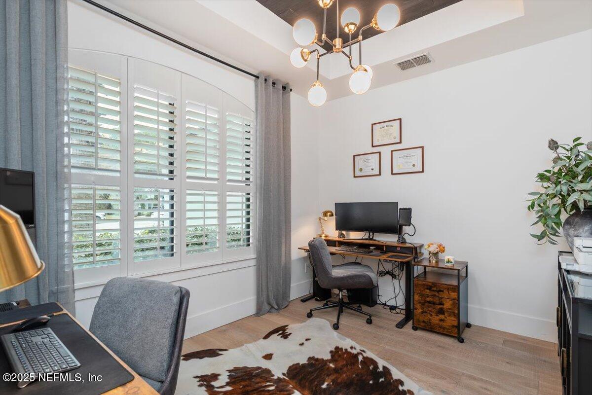 4009 Sioux Circle St. Johns, FL 32259 - Photo 6 of 49 a view of a workspace with furniture and a window