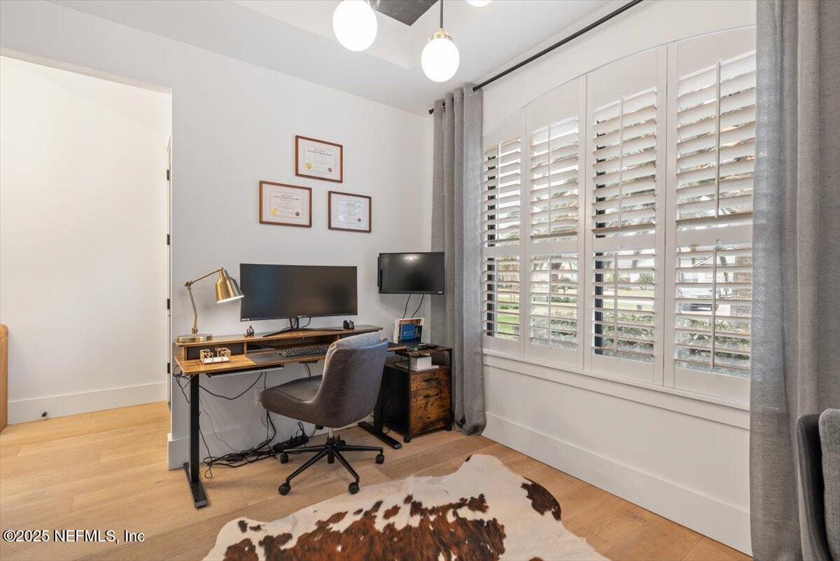 4009 Sioux Circle St. Johns, FL 32259 - Photo 7 of 49 a view of a workspace with furniture and a window