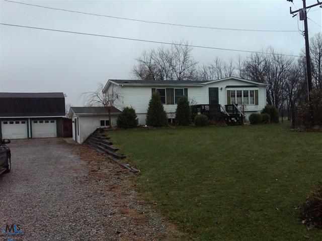 8769 Morris Road Goodells, MI 48027 - Photo 1 of 16 This is the front view of the home.